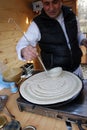 Chef makes thin pancakes with homemade chutney, outdoor on a market for healthy food in Sofia, Bulgaria Ã¢â¬â Jan 1, 2016. Pancakes